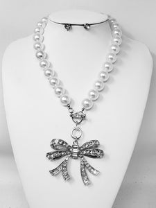 SILVER PEARL NECKLACE SET BOW CLEAR STONES ( 30140 RCL )