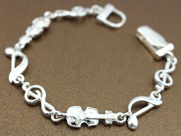 Silver Music Theme Instruments Magnetic Bracelet