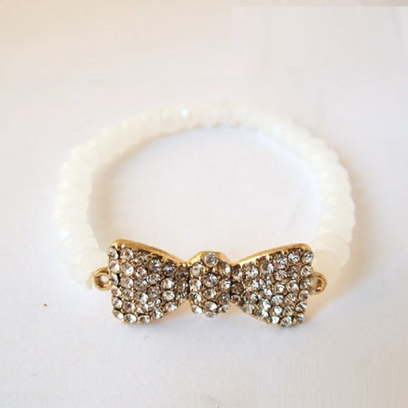 WHITE CRYSTAL STRETCH BRACELET BOW CLEAR STONES ( 1097 IVY )