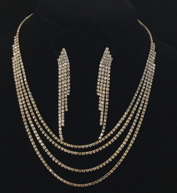 GOLD NECKLACE WITH CLEAR RHINESTONES AND MATCHING EARRINGS ( 0231 )
