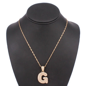 GOLD NECKLACE G PENDANT CLEAR STONES ( 5000 GGD )