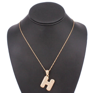 GOLD NECKLACE H PENDANT CLEAR STONES ( 5000 HGD )