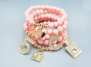 PINK STRETCH BRACELETS GOLD CHARMS MB( 1239 PK )