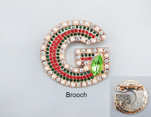GOLD G BROOCH GREEN RED STONES ( 1004 GD )