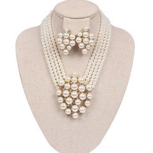 Gold Necklace with Cream Colored Pearls and Matching Clip On Earrings ( 165 CR )