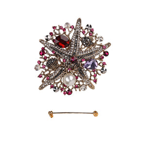GOLD STARFISH BROOCH WITH RED FUCHSIA STONES ( 45 )