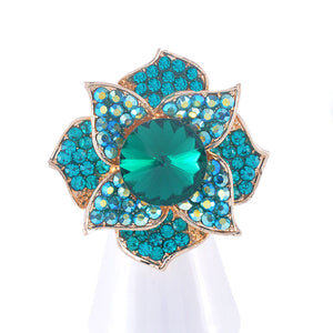 GOLD FLOWER RING BLUE STONES ( 1311 GBL )