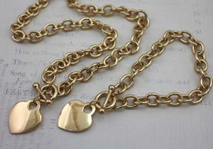 2 Piece Gold Toggle Necklace with Dangling Heart Charm and Matching Bracelet ( 72124 )
