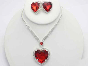 Silver Red Stone Heart Shape Trimmed Pendant Necklace with Matching Stud Earrings ( 18369 )